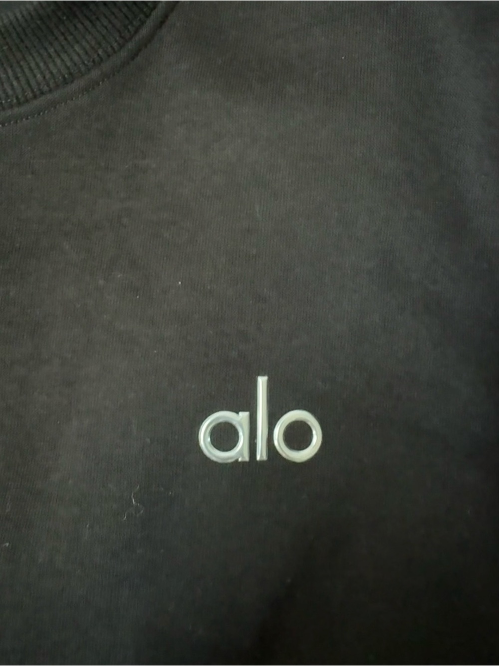 ALO Yoga Black Crewneck with White Tag Logo